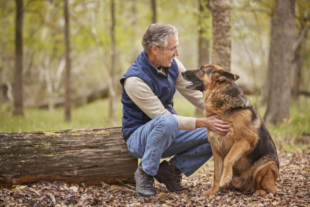 active adult community amenities - man with his dog